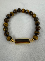 brown tigers eye with tigers eye center piece and gold accent men's bracelet in size 8